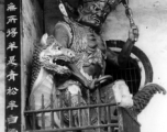 Door guards at a Buddhist temple in China, during WWII.