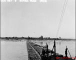 US vehicles cross a pontoon bridge somewhere in Burma.  10CU 5G7 9 BURMA ROAD (RES)