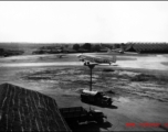 A C-47 transport plane with propellers turning, most likely in Assam, India.    From the collection of David Firman, 61st Air Service Group.