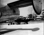 A B-25 as seen from under the wing of an Air Transport Command (ATC) C-109 transport plane based on the B-24 air frame.  From the collection of David Firman, 61st Air Service Group.