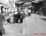 The Golden Horse 金马 archway in Kunming, and the other of the pair, the Emerald Rooster Archway (金马碧鸡坊), in the distance.  In the CBI during WWII.