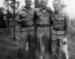 "Dick", Robert Fox, Francis E. Strotman pose in the pine at Yangkai air base, during WWII.