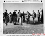 "Little Tiger Joe" stands inspection right along with his foster fathers, the 907th Engineers in the CBI (China) during WWII.