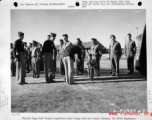 "Little Tiger Joe" stands inspection right along with his foster fathers, the 907th Engineers in the CBI (China) during WWII.