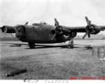 The B-24 "China Clipper" in the CBI, showing damage to one engine.  Selig Seidler was a member of the 16th Combat Camera Unit in the CBI during WWII.