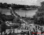 Looking north across the floating bridge at Liuzhou city, Guangxi province, China, near the US Airbase during the Second World War.  Selig Seidler was a member of the 16th Combat Camera Unit in the CBI during WWII.