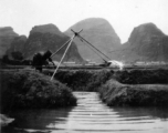 Pumping water into the fields in Guangxi province, either Liuzhou or Guilin.  Selig Seidler was a member of the 16th Combat Camera Unit in the CBI during WWII.
