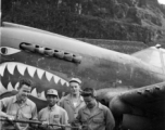 T.T. Hale, S. Seidler, G. Feldman at Guilin (Kwelin) base, in Guangxi province, China, during the Second World War in front of a P-40.  Selig Seidler was a member of the 16th Combat Camera Unit in the CBI during WWII.