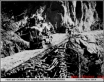 First jeep crosses log bridge near the Burma border.   U. S. Army phot