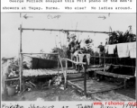 GIs bathing at outdoor showers at Tagap, Burma, during WWII. 1944.