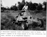 A GI climbs inside a destroyed Japanese light tank in Burma during WWII.  Photo from Walter Ericsson. 