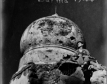 A GI's personalized season's greetings from Burma, in 1944, with a bomb damaged temple dome as background. During WWII.