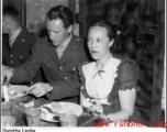 People eating at a party and dance at the Hostel #10 Officer's Club on January 19, 1945.  Photo from Dorothy Yuen Leuba.