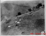 Allied airdrop on a hillside in SW China (or Burma), during WWII.  Image provided by Emery and Beth Vrana.