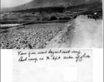 Road and mountain near Camp Schiel. The camp itself can be seen on a ledge on the far left.