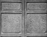 A carved wooden door panel in China. During WWII.  From the collection of Frank Bates.