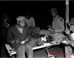 Here the men eat in their tent while on campout at Qingshuihai lake 清水海.