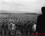 Chinese soldiers stand in ranks during a ceremony during exercises or ceremony in southern China, probably Yunnan province, or possibly in Burma.