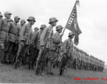 Chinese soldiers  of the 48th Army Division (陆军第四十八师, as noted on banner) stand in rank during rally