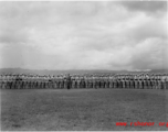 Chinese soldiers stand in ranks during exercises in southern China, probably Yunnan province, or possibly in Burma.