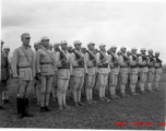 Chinese soldiers standing in ranks during rally.