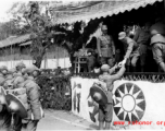 Chinese soldiers during in a ceremony as part of a shooting contest ("射击比赛)" in southern China, probably Yunnan province, or possibly in Burma.