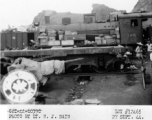 September 27, 1944  During WWII, Chinese artillery piece waiting on a siding near a refugee packed railroad yard at the south station, Liuchow, China.  Photo by Lt. N. J. Dain