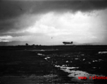 A C-47 lands at the base, probably Luliang in Yunnan province, China.