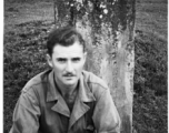 GI with grave marker in Yunnan, during WWII.