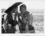 Farm men in rural China near an American base during WWII.