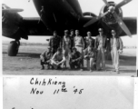 Men pose before C-46 at Zhijiang (Chihkiang) in China during WWII, on November 11th, 1945.  Back: Fong, Capt. Maher, Ehle, Gilfix, Rickards  Front, kneeling: Chung, Capt. Ghent, Scocca, Col. Kernan