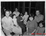 Chaplain Mengel lead his men to participate in outreach to the wartorn and impoverished Chinese countryside. These photos from Chaplain Mengel's private collection, show him with General Chennault, giving out donations from the US airmen. A collection had been taken to help rebuild bombed villages. They also visited mission schools, and assisted blind children's homes. Above, American soldiers interact with blind children.