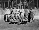 Chinese and American personnel--with sharp knives--at a beef slaughterhouse at Yangkai, set up specifically to provide meat for base personnel. During WWII.